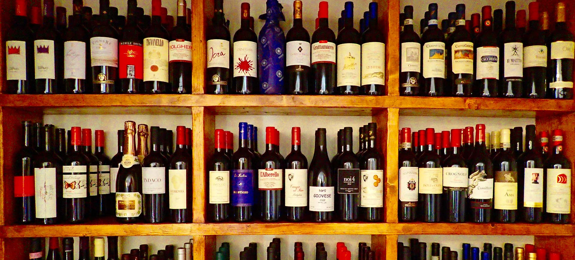 Wine bottles of Sassicaia, and other Bolgheri wineries