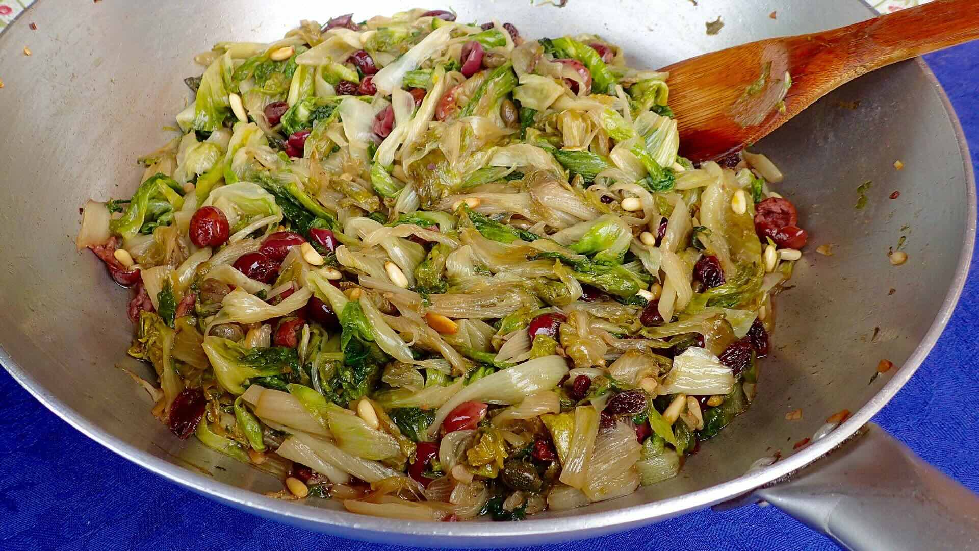 Sautéed escarole with olive, raisins, pine nuts, and capers