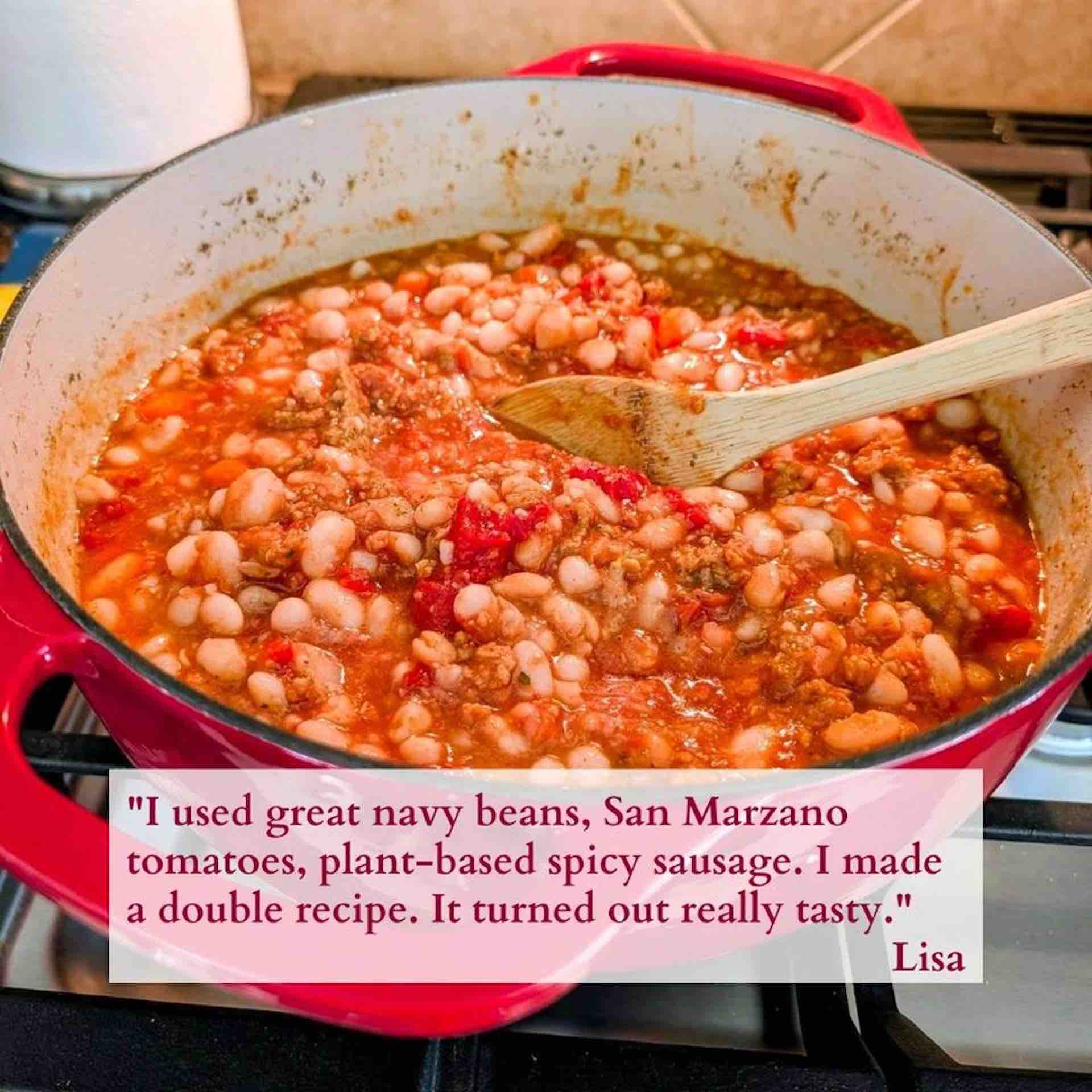 Italian white bean stew with tomatoes and herbs cooking in a pot